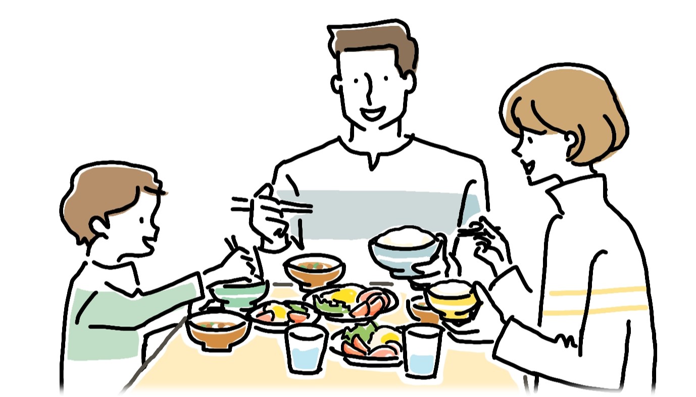 朝食を食べる家族