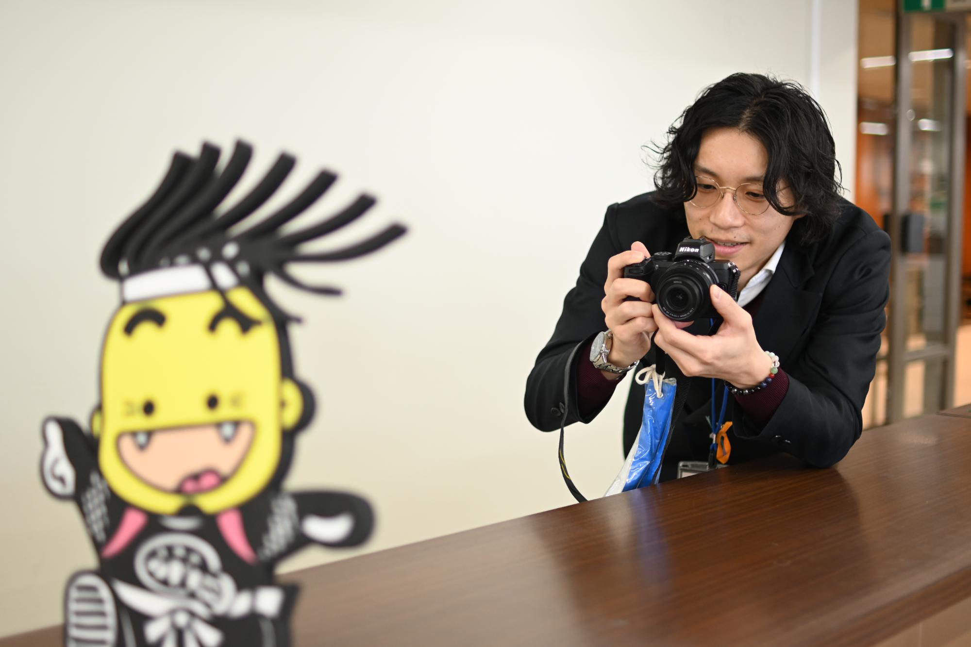 企画部都市プロモーション課島田晶夫